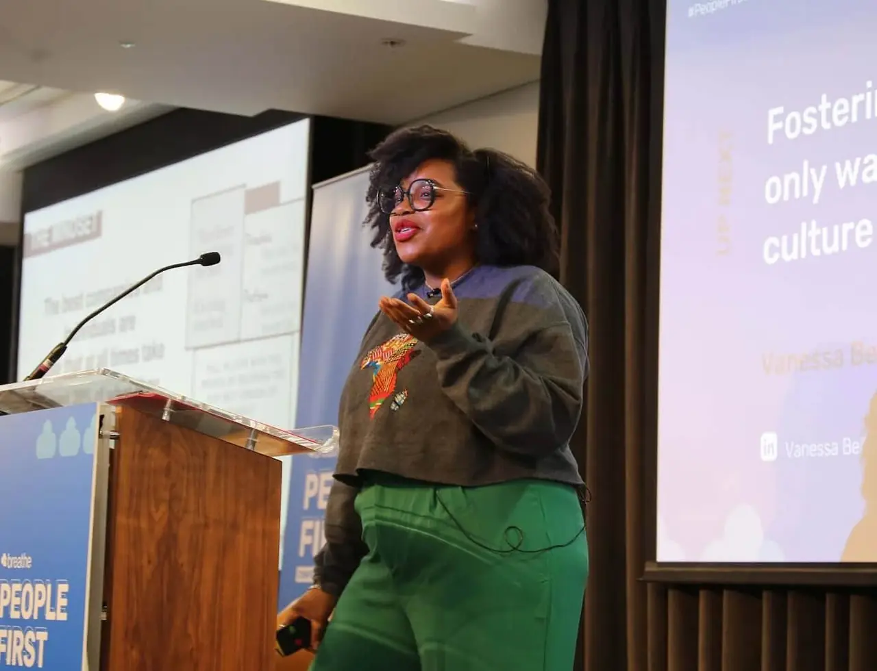 Vanessa presenting on stage