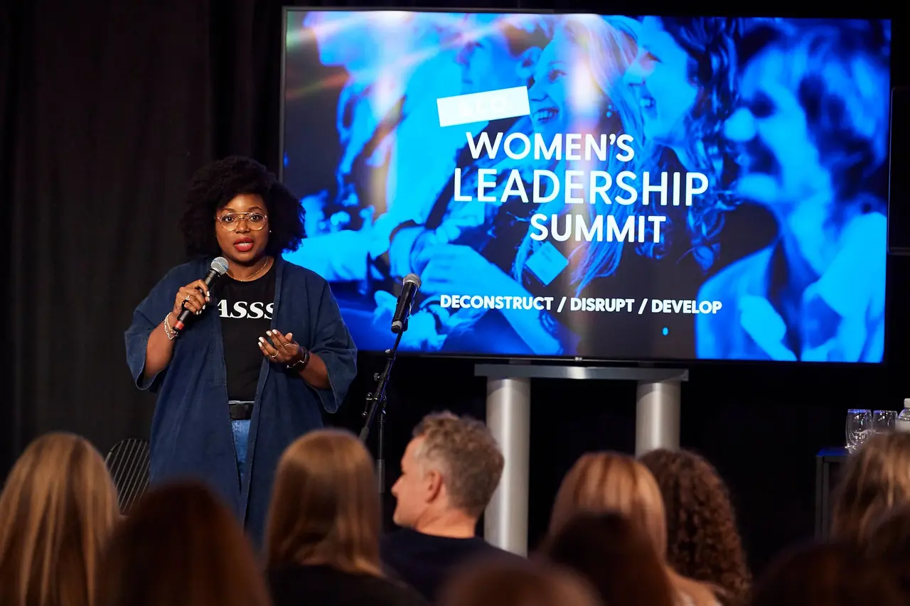 Vanessa on stage at a Women's Leadership Summit